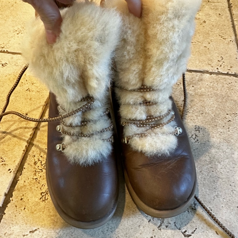Worn women Uggs lace up boots size 7.5